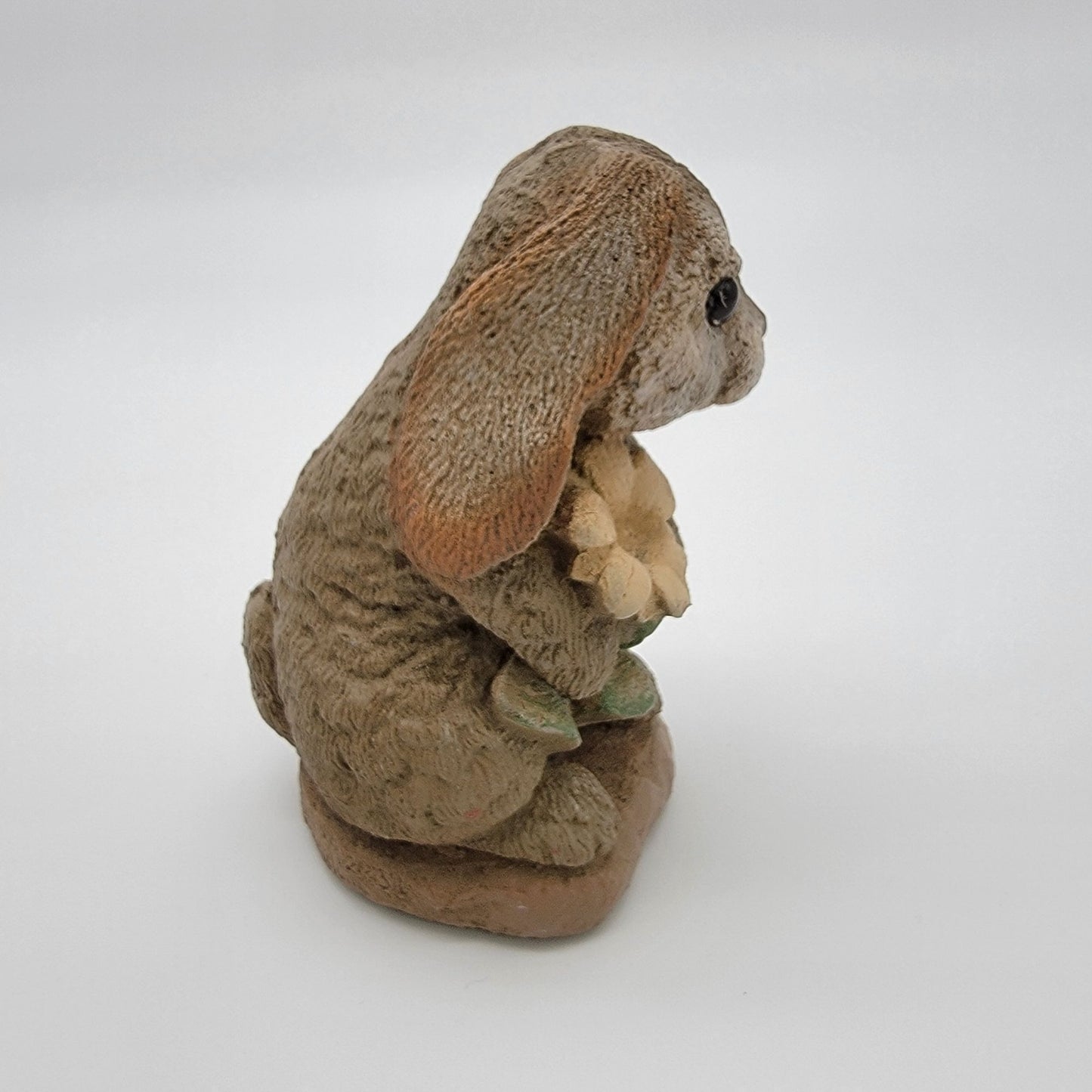 Henri Studio 1995 Cast Stone Bunny With Flower Sculpture Statue