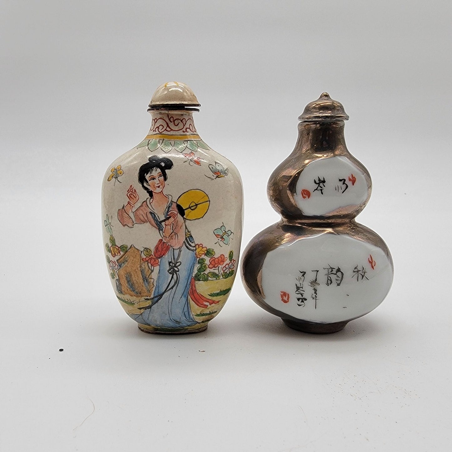 Pair Of Vintage Apocryphal Qianlong NianZhi Enameled Porcelain Snuff Bottles With Wood Stand