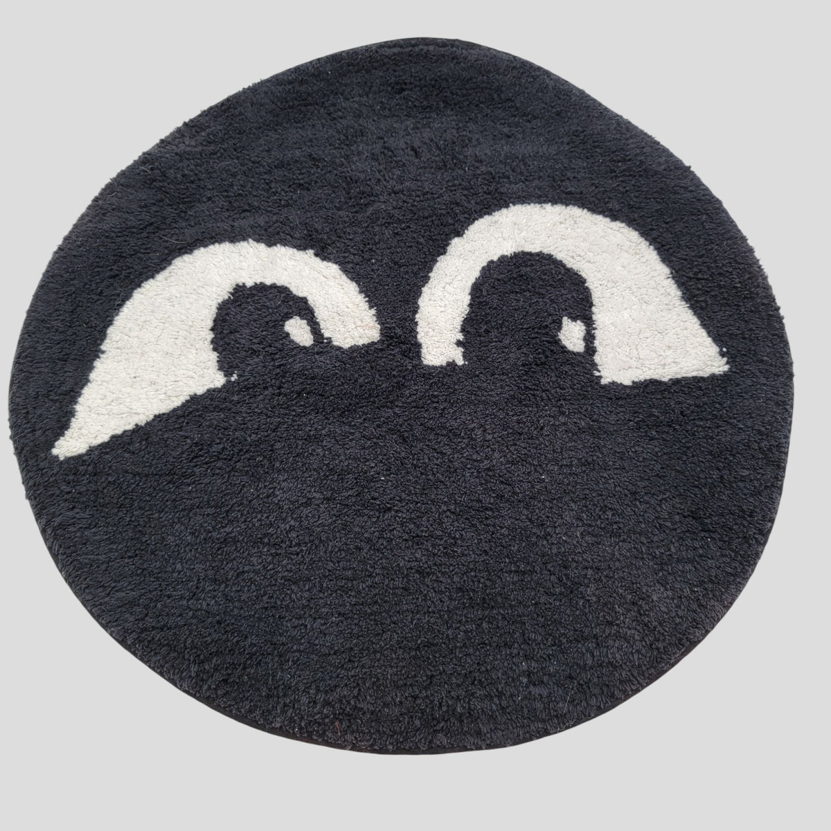 Black Tufted Round Rug Peeking Eyes