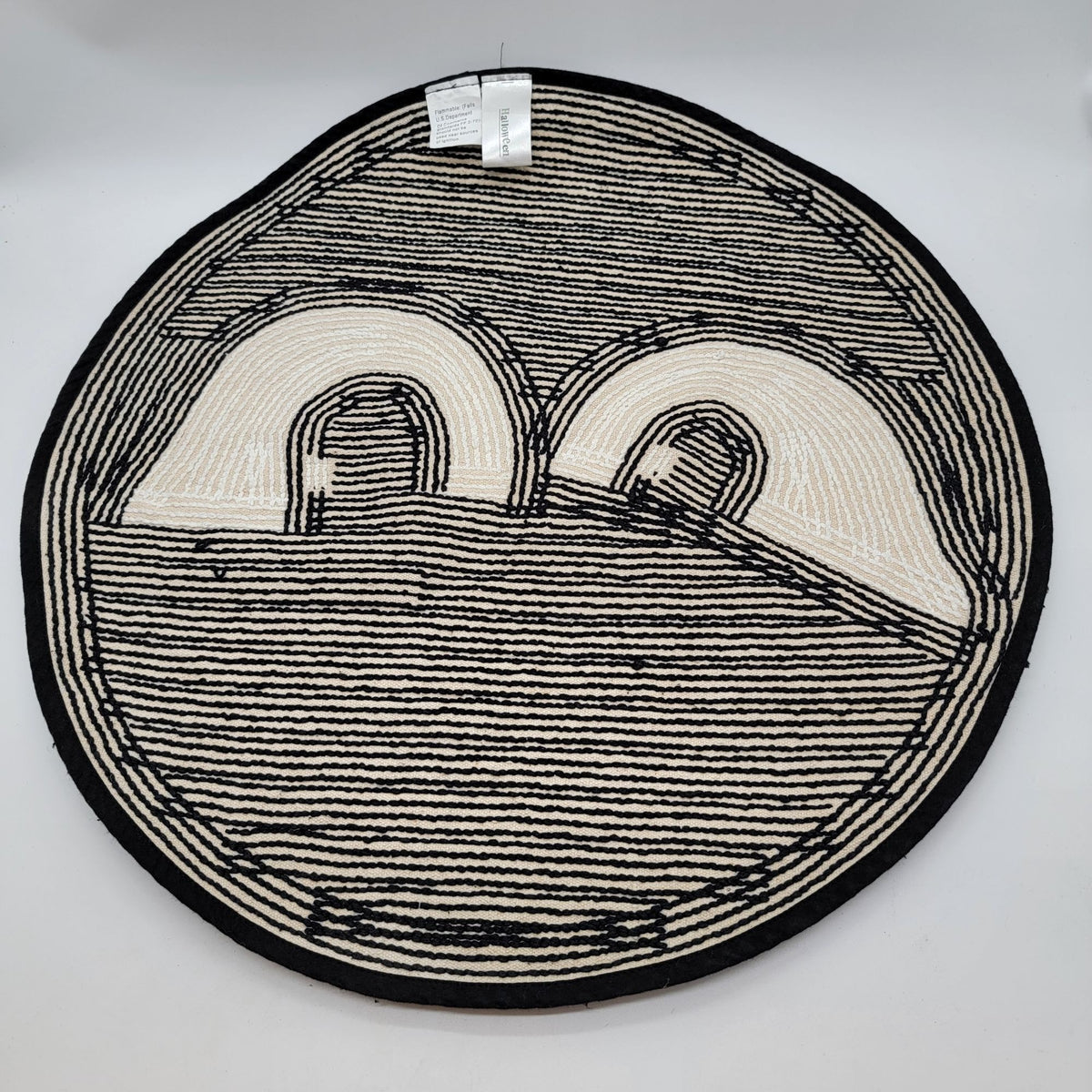 Black Tufted Round Rug Peeking Eyes