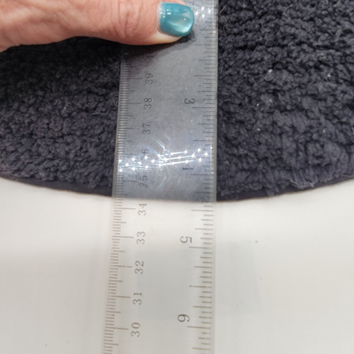 Black Tufted Round Rug Peeking Eyes