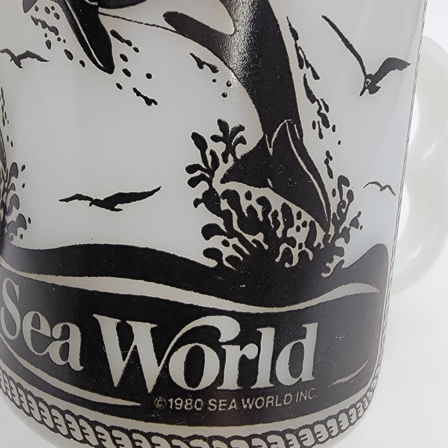Pair of 1980 Vintage Fire King Milk Glass Sea World Footed Mugs Dolphin Orca Design