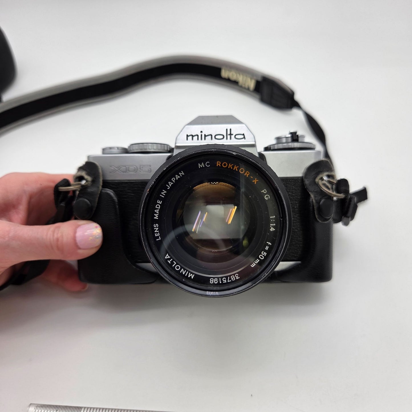 Minolta XG-1 35mm SLR Film Camera W/ 50mm Lens Pentax Leather Cover & Nikon Strap