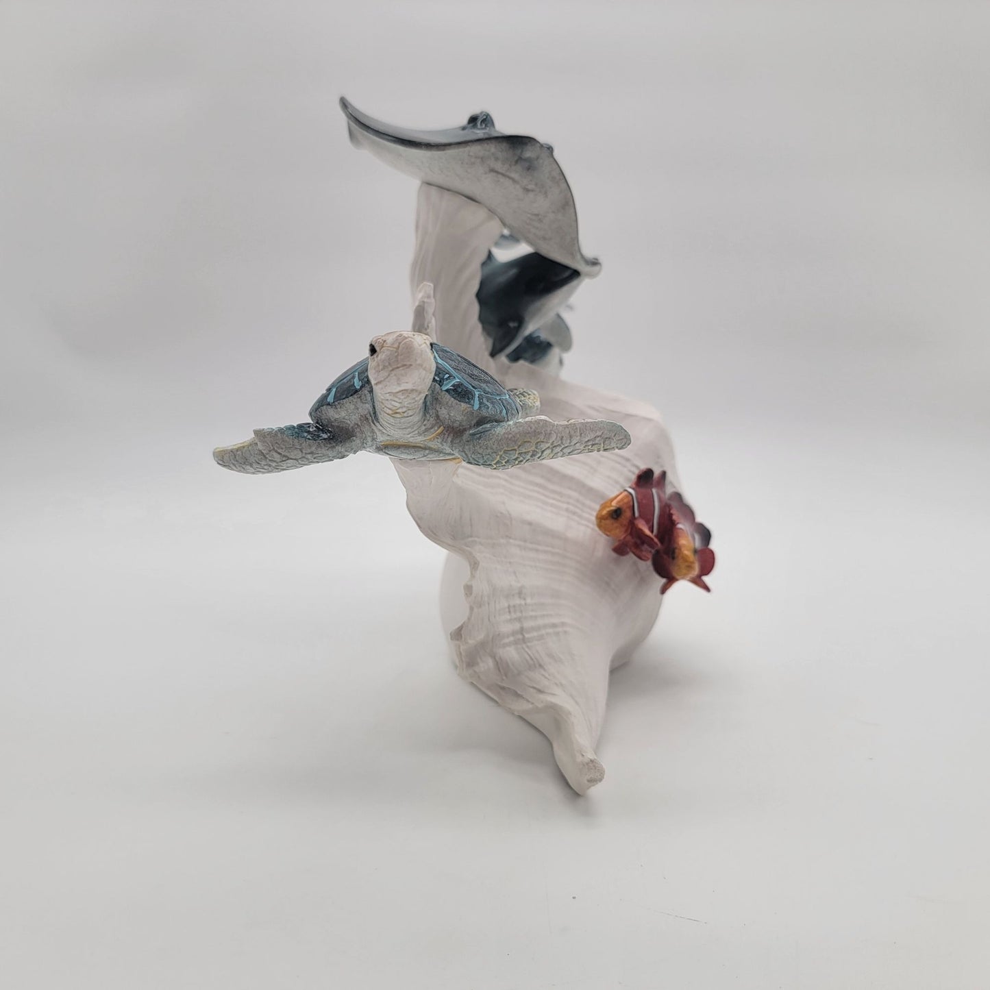 Ocean Life Sculpture On Faux Conch Shell