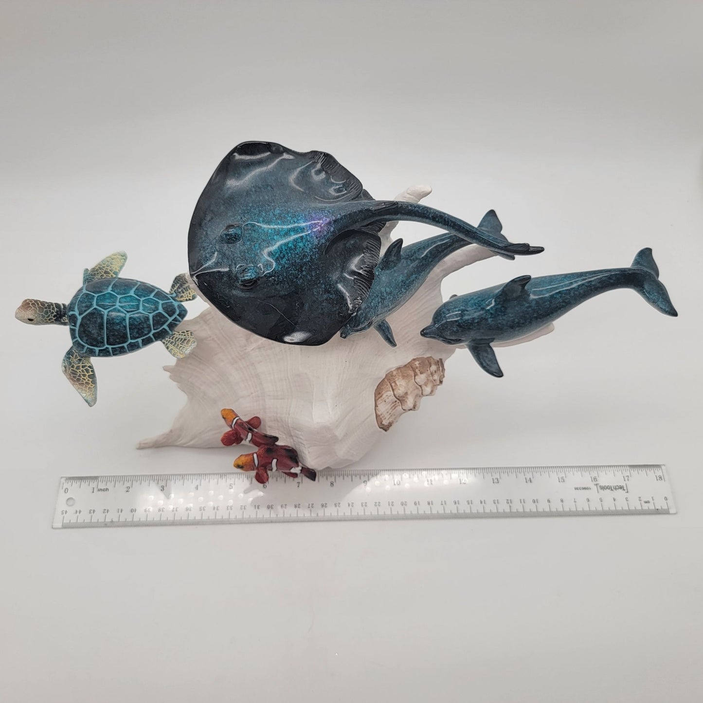 Ocean Life Sculpture On Faux Conch Shell