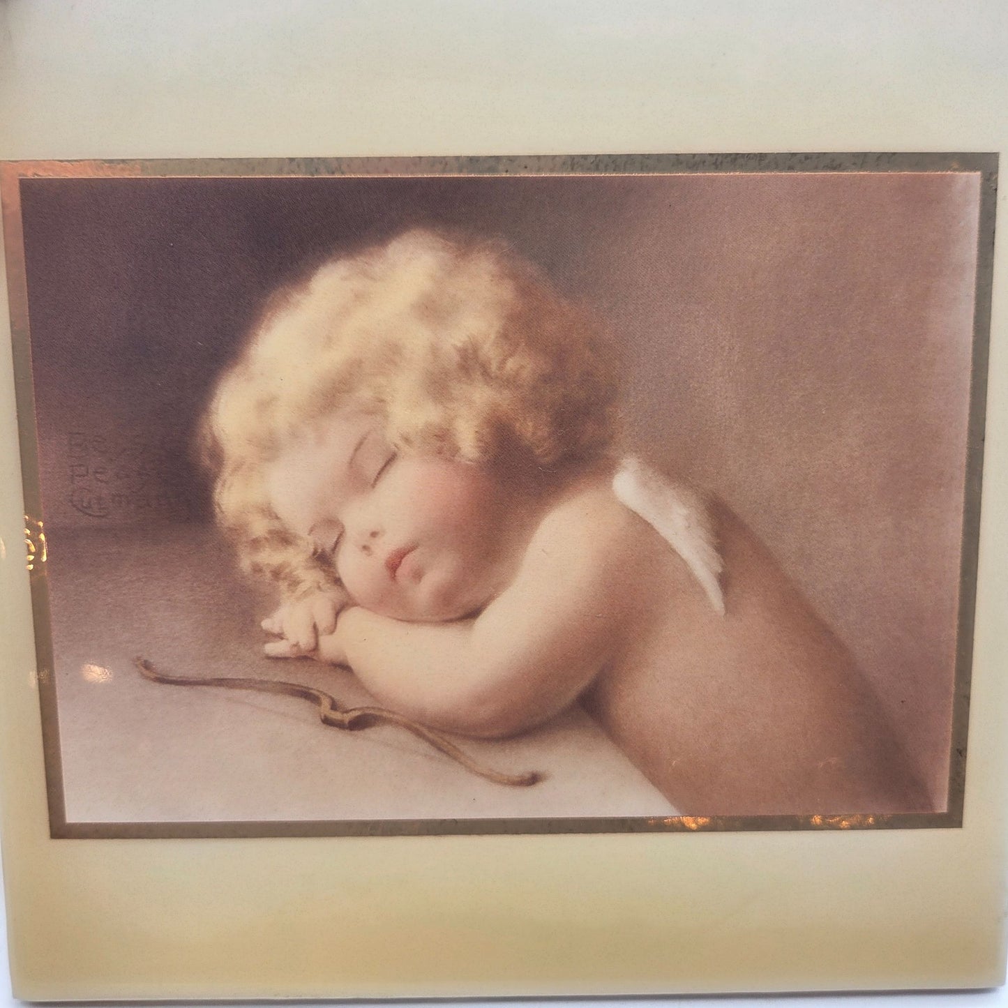 A.R.T. Co. Bessie Pease Guttman Cupid Caught Napping Tile Wall Art