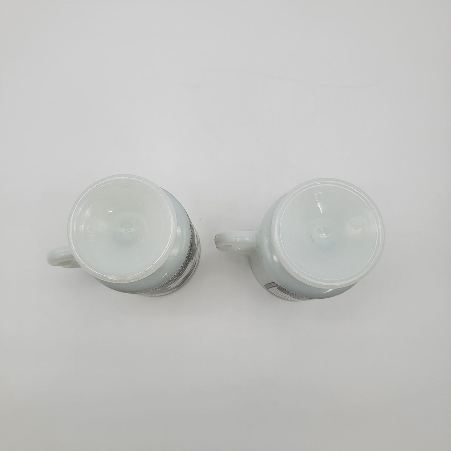 Pair of 1980 Vintage Fire King Milk Glass Sea World Footed Mugs Dolphin Orca Design