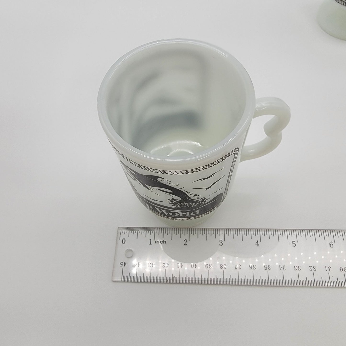 Pair of 1980 Vintage Fire King Milk Glass Sea World Footed Mugs Dolphin Orca Design