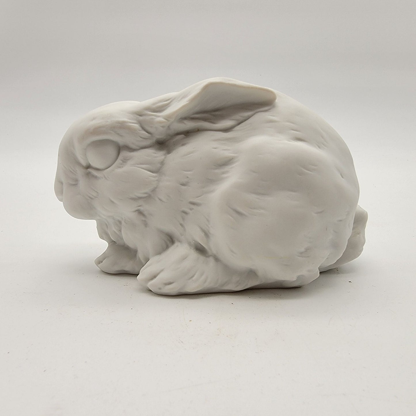 Kaiser White Bisque Porcelain Laying Rabbit Figurine #518